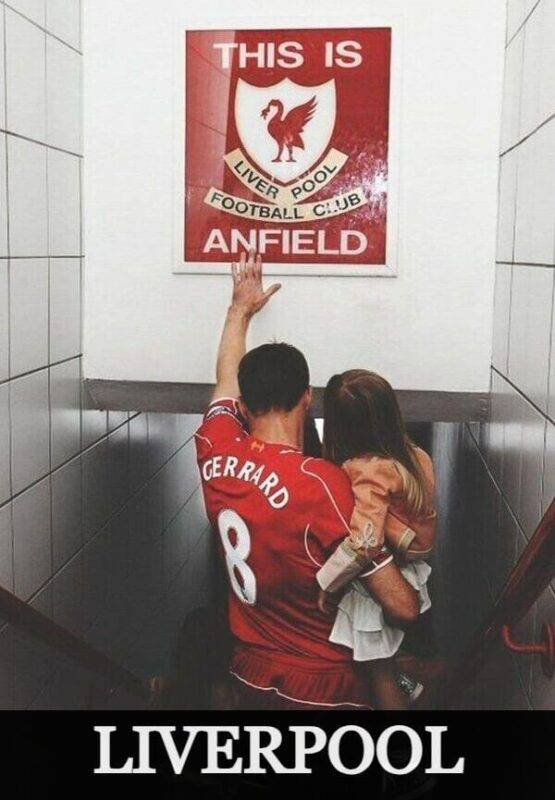 Liverpool FC players celebrating in red home jersey with club badge